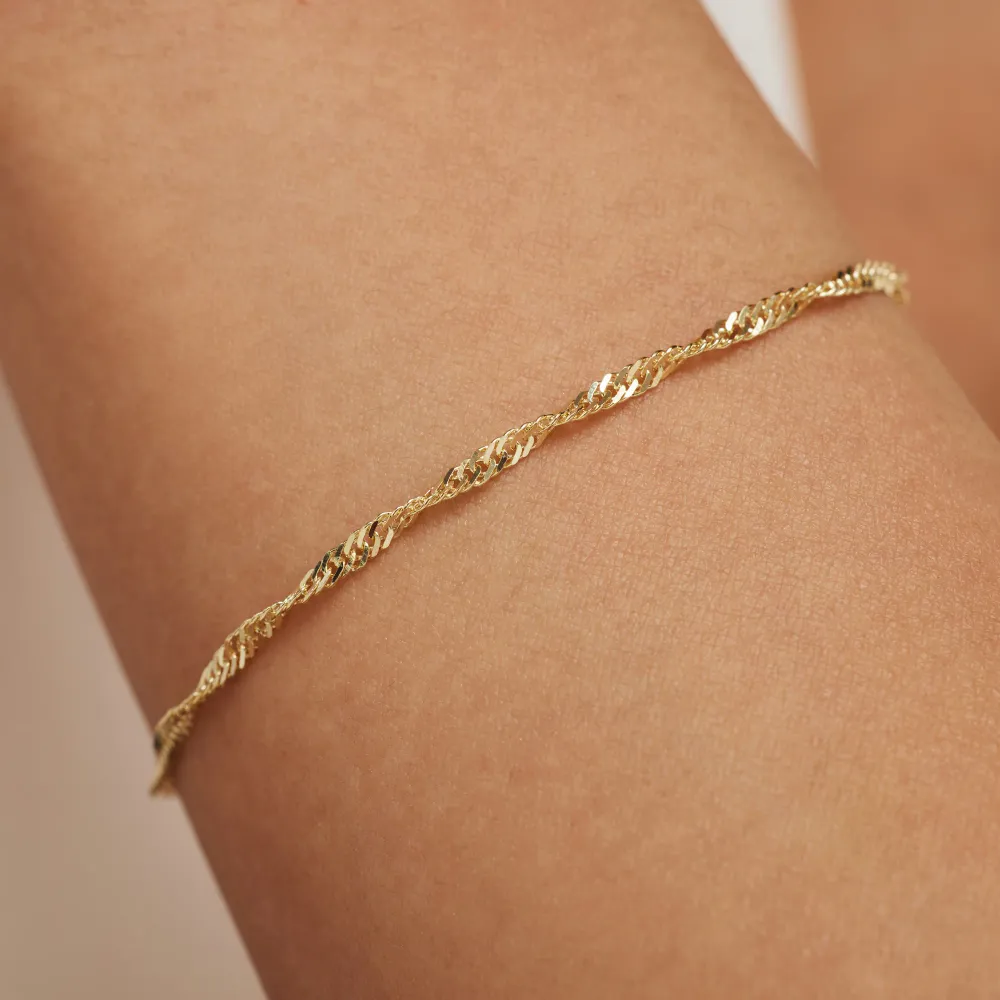 Pulseira Rivoli Lilou em ouro de 14 quilates com torção