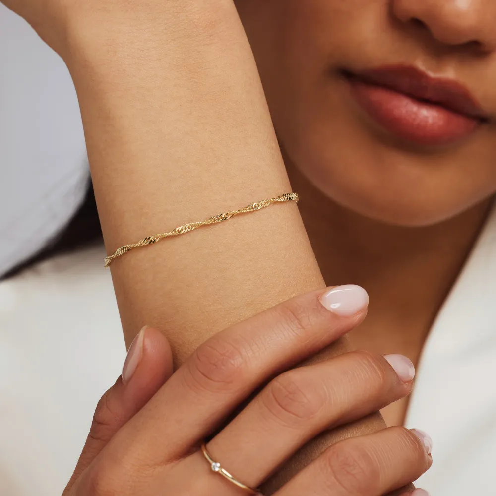 Pulseira Rivoli Lilou em ouro de 14 quilates com torção